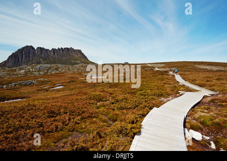 Hikers on the boardwalk. Cradle Mountain National Park, Tasmania Stock Photo