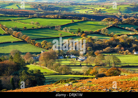 An autumnal view overlooking the patchwork landscape of Dartmoor and Sheepstor Village Stock Photo