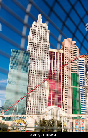 New York New York Hotel & Casino viewed through the weldmesh cage of a pedestrian bridge. Stock Photo
