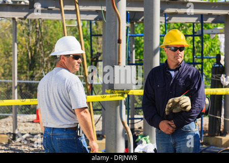 Power engineers at high voltage power distribution station, Braintree, Massachusetts, USA Stock Photo