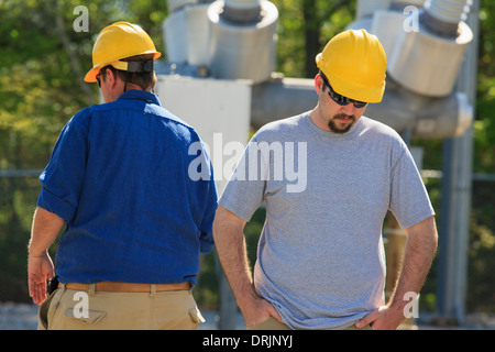 Power engineers at high voltage power distribution station, Braintree, Massachusetts, USA Stock Photo