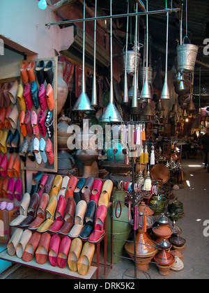 Slippers, tagines and lanterns for sale in the souk, Taroudannt, Morocco, North Africa Stock Photo