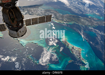 View from the International Space Station of the Caribbean showing Cuba and Andros Island in the Bahamas framed by the docked Soyuz spacecraft December 23, 2013. Stock Photo