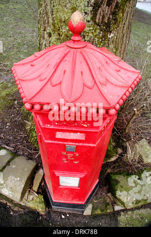 Original Victorian, hexagonal 'Penfold' letter box (in use), Buxton, Derbyshire, UK Stock Photo