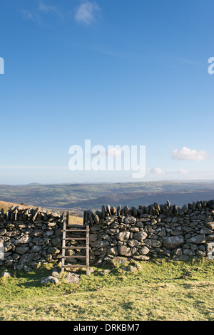Stile over wall on Conwy Mountain in Snowdonia National Park Stock Photo