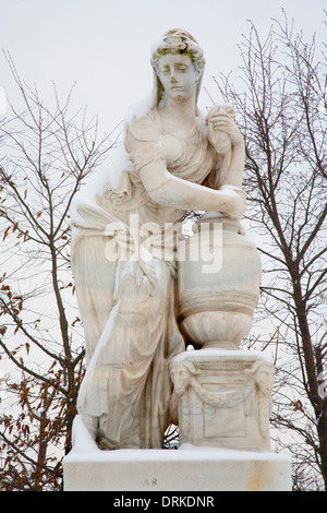 VIENNA, AUSTRIA - JANUARY 15, 2013: Statue of Artemis from gardens of Schonbrunn palace in winter Stock Photo