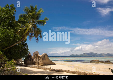 Fantastic sandy beach typical of the Seychelles rock formations behind the island of Praslin, Anse Union, La Digue, Seychelles, Indian Ocean, Africa - 2013 Stock Photo