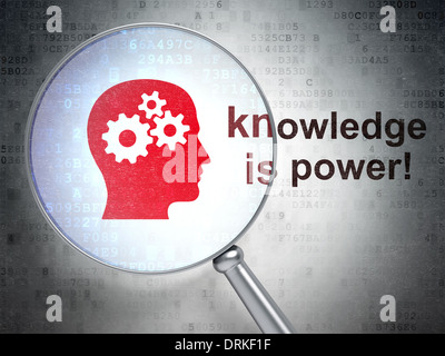 Education concept: Head With Gears with optical glass on digital ...