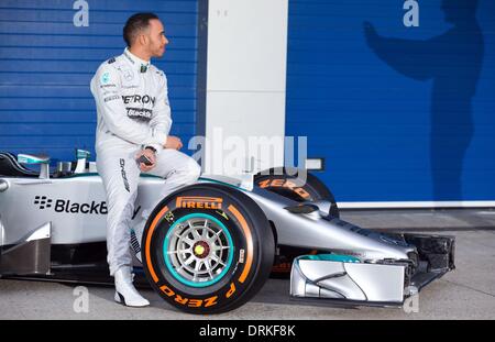 Jerez de la Frontera, Southern Spain. 28th Jan, 2014. British Formula One driver Lewis Hamilton of Mercedes AMG poses at the launch of the new F1 W05 for the upcoming Formula One season at the Jerez racetrack in Jerez de la Frontera, Southern Spain, 28 January 2014. Photo: Jens Buettner/dpa/Alamy Live News Stock Photo