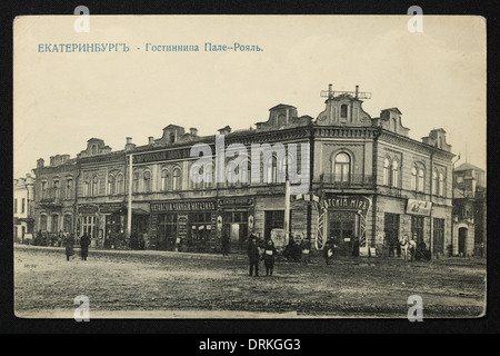 Palais Royal Hotel in Yekaterinburg, Russian Empire. Black and white vintage photograph by Russian photographer Nikolai Vvedensky dated from the beginning of the 20th century issued in the Russian vintage postcard published by M.S. Semkov, Yekaterinburg. Text in Russian: Yekaterinburg. Palais Royal Hotel. Courtesy of the Azoor Postcard Collection. Stock Photo