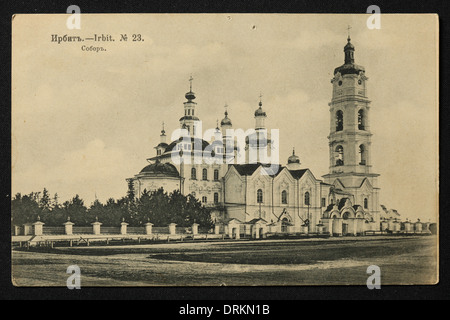 Epiphany Cathedral in the town of Irbit in the Ural Mountains, Russian Empire. Black and white vintage photograph by an unknown photographer dated from the beginning of the 20th century issued in the Russian vintage postcard published by N.D. Larkov. Text in Russian: Irbit. Cathedral. Irbit is a town in Sverdlovsk region, Russia, located some 203 km from Yekaterinburg. The town was famous in the 19th century for the Irbit Fair, which was the second largest in Russia. Courtesy of the Azoor Postcard Collection. Stock Photo