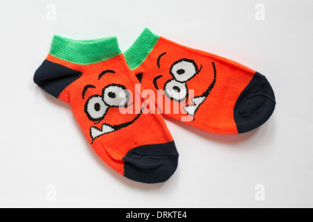 Pair of children's colourful scary face socks isolated on white background - ideal for Halloween Stock Photo