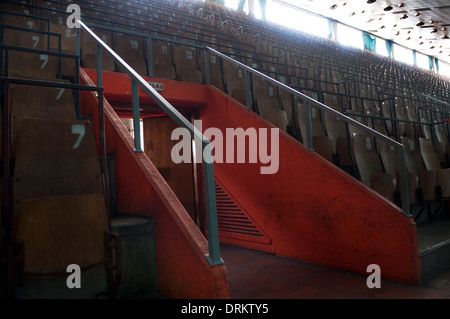 Empty basketball arena seating with red painted stairway, Skenderija, Sarajevo, Bosnia and Herzegovina Stock Photo