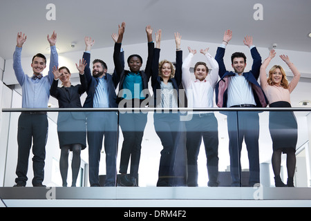 People Standing Behind Railing Germany, Neuss, Business people standing in elevator Stock Photo - Alamy