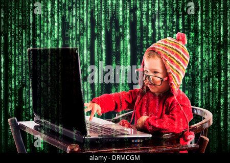 Little child typing on the keyboard.Selective focus on the child Stock Photo