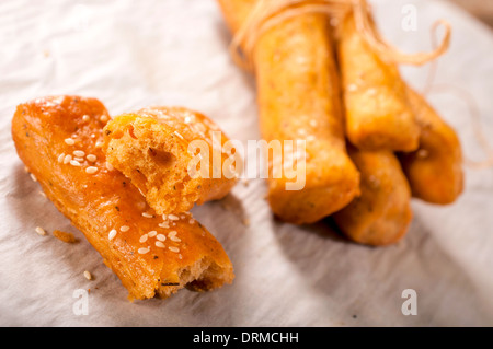 Homemade salted sticks with sesame and cumin.Selective focus on the left sticks Stock Photo