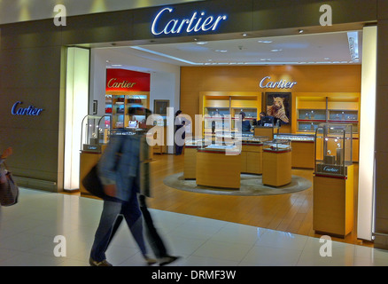 Interior of Kansai Airport, Osaka, Japan, in the International Departures  lounge. View into the Cartier store with Cartier logo over the entrance  Stock Photo - Alamy