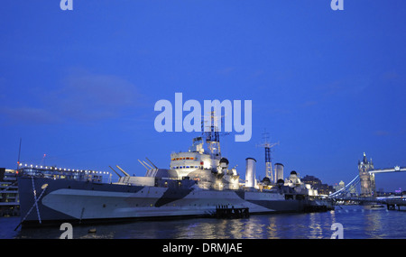 River Thames at dusk with HMS Belfast and Tower Bridge London England Stock Photo