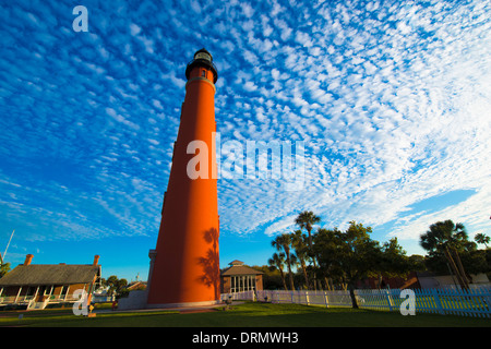 Ponce Inlet Lighthouse Florida Lighthouse Point Park Buttermilk clouds along Atlantic Ocean Built in 1867 Tallest lighthouse Stock Photo