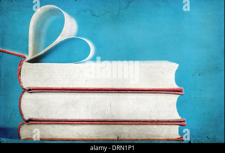Vintage photo of heart shaped book pages Stock Photo