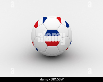 Soccer ball and national flag of Serbia lies on the green grass Stock