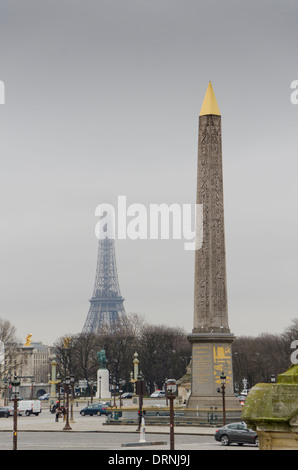 Place de la Concorde with Eiffel tower covered in clouds in background. Paris, France. Stock Photo