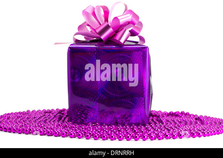 Violet gift with an ornament on the white isolated background Stock Photo