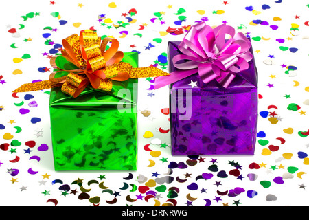 Violet and green gift on the isolated celebratory background Stock Photo