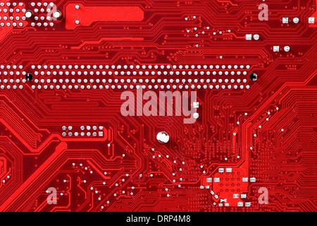 Closeup of a red printed circuit board Stock Photo