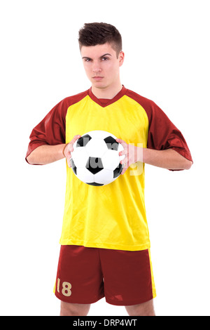Football player with a ball isolated in white Stock Photo