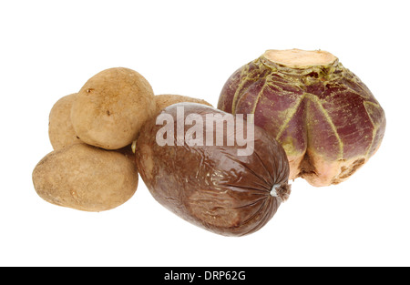 Ingredients for a traditional Scottish Burns night meal,haggis,neaps and tatties isolated against white Stock Photo