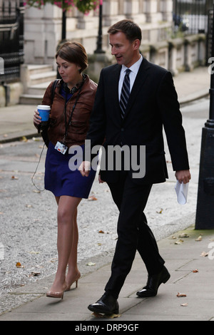 Health Secretary Jeremy Hunt MP (R) arrives to Downing Street for a cabinet meeting in London Britain 16 October 2012. Stock Photo