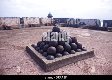 Cannon balls stacked and ready to go, at El Morro fort in Old San Juan, Puerto Rico Stock Photo