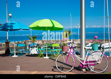 Cafe on the lakeside of Lac Leman, Lake Geneva, in Evian-les-Bains, France Stock Photo