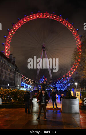 London UK, 30th January 2014 : The EDF lit red and gold at the London Eye celebration Chinese New Year's Eve. Photo by See Li/Alamy Live News Stock Photo