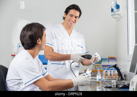 Technicians Scanning Barcode On Samples Stock Photo