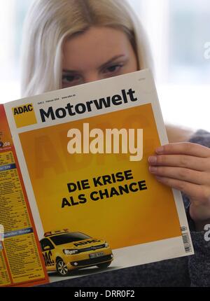 Munich, Germany. 31st Jan, 2014. The current edition of German motorclub ADAC magazine 'ADAC Motorwelt' in Munich, Germany, 31 January 2014. The ADAC discussed the scandal about the manipulation of figures for the ADAC car prize 'Gelber Engel'. Photo: STEPHAN JANSEN/dpa/Alamy Live News Stock Photo