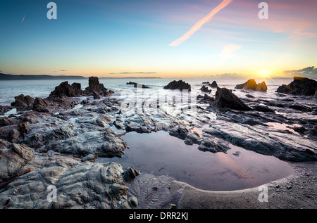 Rock pools on the beach at Looe in Cornwall Stock Photo