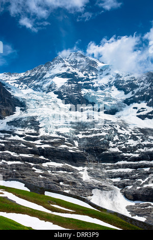 The Eiger Glacier, Eigergletscher, and Monch mountain in the Swiss Alps, Switzerland Stock Photo