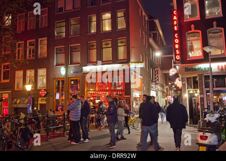 Lively Red Light District by night in Amsterdam, Holland, the Netherlands. Stock Photo