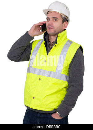 Portrait of engineer with hard hat and yellow reflective safety vest talking on cell phone Stock Photo
