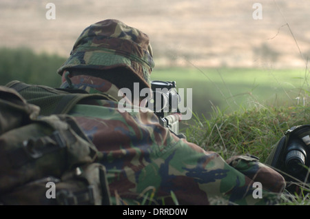 British army sniper team with his L115A3 sniper rifle, training in Brecon Stock Photo