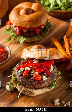 Healthy Vegetarian Portobello Mushroom Burger with Cheese and Veggies Stock Photo