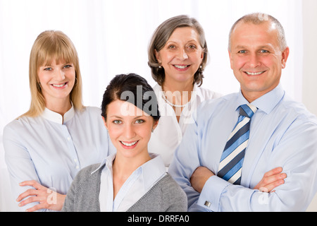 Confident business team smiling portrait Stock Photo
