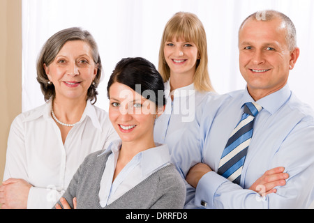 Confident business team smiling portrait Stock Photo