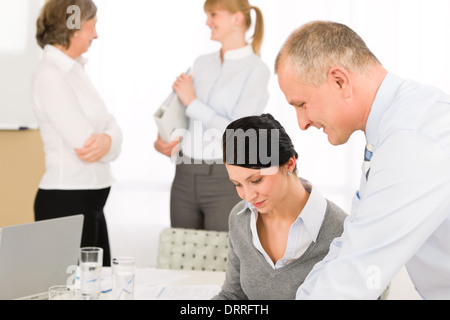 Sales meeting business people discussing Stock Photo