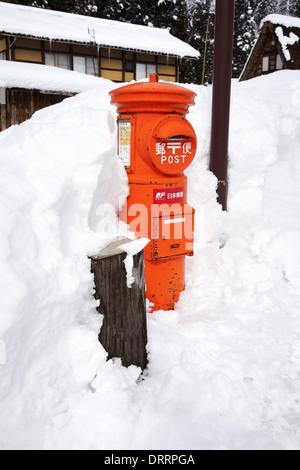 Japanese red old style post box on the street Stock Photo