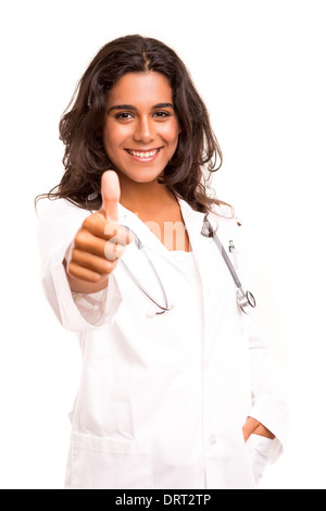 Young doctor signaling ok, isolated over a white background Stock Photo