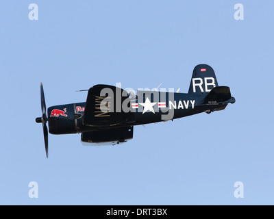 Red Bull Chance Vought F4U Corsair World War II fighter flying at Flying Legends Stock Photo