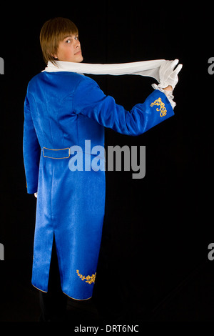 Prestidigitator in tail-coat with neckerchief. Stock Photo